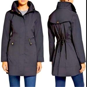 Cole Haan signature back bow rain coat.